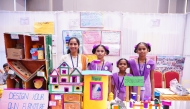 Teacher and students displaying EAA's Project-Based Learning initiative in India.