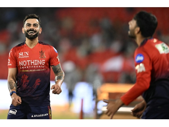 Royal Challengers Bengaluru's Indian cricket player Virat Kohli gestures as he practices before the start of the 2026 Indian Premier League (IPL) T20 match between Royal Challengers Bengaluru and Kolkata Knight Riders at the Shaheed Veer Narayan Singh International Stadium in Raipur on May 13, 2026. (Photo by Noah Seelam / AFP)