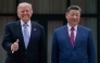 US President Donald Trump (L) poses for photos with China's President Xi Jinping during a visit to Zhongnanhai Garden in Beijing on May 15, 2026. (Photo by Evan Vucci / POOL / AFP)
