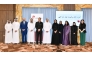 Officials pose for a group photo with the participants of public speaking training programme.