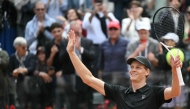Italy's Jannik Sinner celebrates after winning the semi-final against Russia's Daniil Medvedev at the ATP Rome Open tennis tournament at Foro Italico in Rome on May 16, 2026. (Photo by Tiziana FABI / AFP)