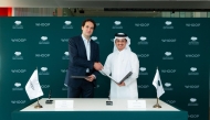 CEO of Qatar Foundation Yousif Al-Naama (right) and Founder and CEO of WHOOP Will Ahmed at the signing ceremony. 