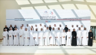 Kahramaa President H E Eng Abdulla bin Ali Al Theyab along with directors of sectors and departments with the winners during the ceremony.