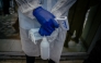  A health worker monitors visitors arriving at the Rodolphe Mérieux Laboratory, National Biomedical Research Institute (INRB) in Goma, on May 19, 2026. (Photo by Jospin Mwisha / AFP)
