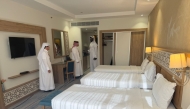 Qatar Hajj Mission officials inspect arrangements at an accommodation.