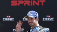 Team Gresini Racing MotoGP's Alex Marquez celebrates winning the Sprint Race at the Catalunya Moto GP Grand Prix at the Catalunya racetrack in Montmelo, near Barcelona, on May 16, 2026. (Photo by Lluis GENE / AFP)
