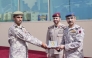 Chief of Staff of the Qatari Armed Forces H E Lieutenant General (Pilot) Jassim bin Mohammed Al Mannai and  Amiri Guard Commander H E Major General Staff Mohammed bin Sultan Al Suwaidi with a graduate during the ceremony. 
