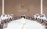 Minister of Commerce and Industry H E Sheikh Faisal bin Thani bin Faisal Al Thani with other officials during the meeting.