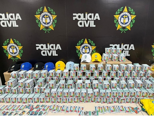 Handout picture released by Rio de Janeiro's Civil Police shows seized counterfeit Panini World Cup album stickers at the Civil Police headquarters, in Rio de Janeiro, Brazil on May 22, 2026. (Photo by Handout / RIO DE JANEIRO CIVIL POLICE / AFP)