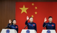 Chinese astronauts Zhu Yangzhu (C), Zhang Zhiyuan (R) and Lai Ka-ying, for the upcoming Shenzhou-23 crewed spaceflight mission, meet the press at the Jiuquan Satellite Launch Center in northwest China, May 23, 2026. (Xinhua/Lian Zhen)