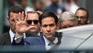 US Secretary of State Marco Rubio gestures as he walks out of the international headquarters of Missionaries of Charity known as the 