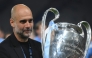 (Files) Manchester City's Spanish manager Pep Guardiola celebrates with the European Cup trophy on June 10, 2023. (Photo by Franck Fife / AFP)
 