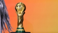 The 2026 FIFA World Cup winner's trophy is seen on stage at the 2026 World Cup halftime show announcement in New York City on May 14, 2026. (Photo by Charly Triballeau / AFP)
