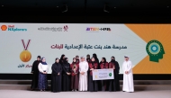 MoEHE Undersecretary Ibrahim bin Saleh Al Nuaimi and other officials with winners at the event. 
