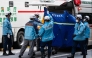 A person is taken on a stretcher to an ambulance by paramedics at the Ginza 6 Shopping Center in Tokyo on May 25, 2026, after an individual allegedly sprayed a substance in the area. (Photo by Andrew Caballero-Reynolds / AFP) 