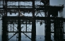 A paddleboarder is seen between the stanchions of the derelict West Pier off the beach in Brighton, on the south coast of England on May 25, 2026, as Monday is expected to be the hottest bank holiday.(Photo by Ben Stansaal / AFP)
 
