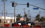 Orange County sheriff deputies block Western Avenue at Katella Avenue as roads remain closed after a chemical leak from a large storage tank prompted evacuations in Garden Grove, California, on May 24, 2026. Photo by Blake Fagan / AFP