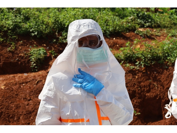 A medical worker puts on protective suits before the burial of an Ebola victim in Mongbwalu, Ituri province, eastern Democratic Republic of the Congo (DRC), May 24, 2026. Photo for representational purposes only. (Str/Xinhua)