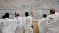 Muslim pilgrims perform the symbolic 'stoning of the devil' ritual as part of the Hajj pilgrimage in Mina on May 27, 2026. (Photo by Zain Jaafar / AFP)