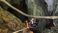 This handout image released by Metta Tham Rescue Kalasin on May 26, 2026 shows rescue workers inside a cave in Xaisomboun province. Photo by Handout / Metta Tham Rescue Kalasin / AFP