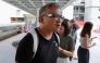 Ronson Chan, a journalist and former chairman of the Hong Kong Journalists Association, wearing a black shirt that reads 