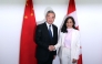 Canada's Minister of Foreign Affairs Anita Anand (R) shakes hands with China's Minister of Foreign Affairs Wang Yi ahead of a bilateral meeting in Ottawa, on May 29, 2026. (Photo by Dave Chan / AFP)
 