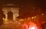 PSG supporters gather on the Champs-Elysees Avenue after the club won the UEFA Champions League final between Paris Saint-Germain (PSG) and Arsenal FC played in Budapest, in Paris on May 30, 2026. (Photo by ROMEO BOETZLE / AFP)