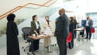 Visitors at the Ministry of Public Health awareness campaign booth.