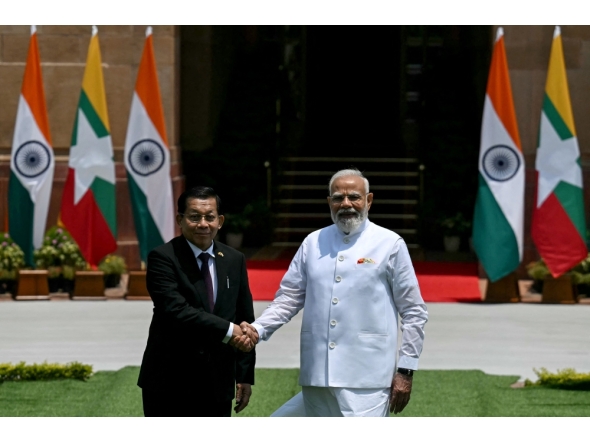 India's Prime Minister Narendra Modi (R) shakes hands with Myanmar's President Min Aung Hlaing before their meeting at the Hyderabad House in New Delhi on June 1, 2026. (Photo by Arun Sankar / AFP)