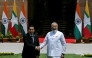 India's Prime Minister Narendra Modi (R) shakes hands with Myanmar's President Min Aung Hlaing before their meeting at the Hyderabad House in New Delhi on June 1, 2026. (Photo by Arun Sankar / AFP)