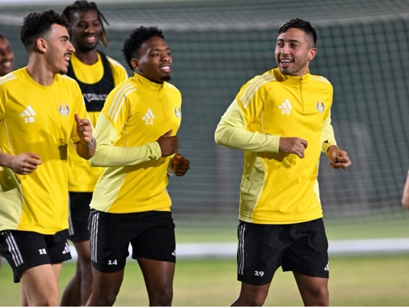 Al Gharafa players attend a training session in this file photo.