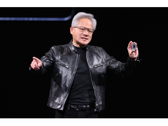 Nvidia CEO Jensen Huang introduces a new chip for Windows laptops during his keynote speech at Computex 2026 in Taipei on June 1, 2026. (Photo by I-HWA CHENG / AFP)