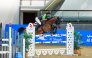 Saudi Arabia’s Khaled Al Hadi guides Capoen during the Youth Champions class event. 