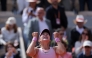 Russia's Mirra Andreeva celebrates after winning her women's final singles match against Poland's Maja Chwalinska on day 14 of the French Open tennis tournament on Court Philippe-Chatrier at the Roland-Garros Complex in Paris on June 6, 2026. (Photo by Thomas Samson / AFP)
 