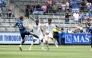 Qatar's Jassim Jaber (right) controls the ball during the match.