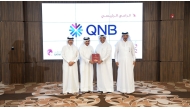 QC chairman Sheikh Khalifa bin Jassim bin Mohammed Al Thani with Senior Executive Vice President of Corporate and Institutional Banking Services at QNB Group Khaled Ahmed Al Sada, and other officials. 