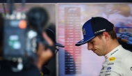 Red Bull Racing's Dutch driver Max Verstappen reacts after taking the car back to the garage as he withdraws from the race during Monaco Formula 1 Grand Prix at the Monaco street circuit in Monaco, ahead of the, on June 7, 2026. Photo by Yves Herman / POOL / AFP
