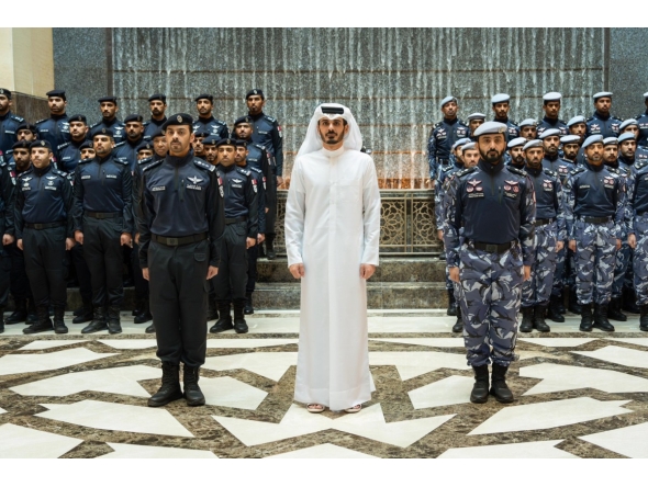 Minister of Interior and Commander of the Internal Security Force “Lekhwiya” – Chairman of the Security Committee H E Sheikh Khalifa bin Hamad bin Khalifa Al Thani with members of Qatari security forces.