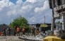 Responders conduct search and rescue operations at the site of a collapsed building after a 7.8 magnitude earthquake in General Santos City on June 9, 2026. (Photo by Jam STA ROSA / AFP)