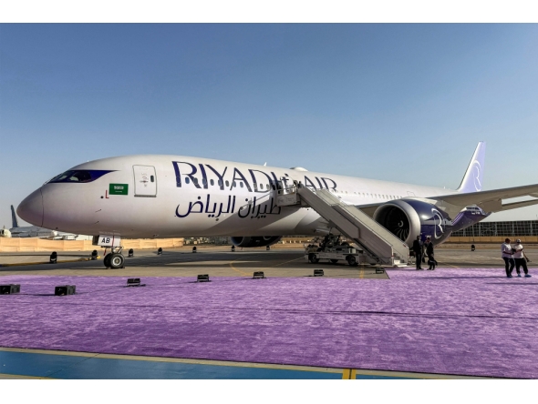 A Boeing 787-9 Dreamliner aircraft of Saudi airline Riyadh Air is pictured on the tarmac at King Khalid International Airport in Riyadh (Photo by Sofiane Alsaar/ AFP)