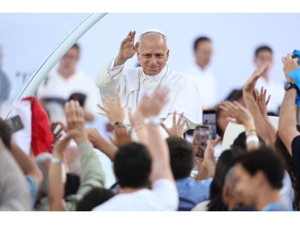 Pope Leo XIV greets the crowd as he arrives to attend a prayer vigil at the Lluis Companys Olympic Stadium in Barcelona, on June 9, 2026. (Photo by Josep Lago / AFP)