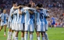 Thiago Almada of Argentina celebrates with teammates after scoring the team's third goal during the international friendly match between Argentina and Iceland at Jordan-Hare Stadium on June 09, 2026 in Auburn, Alabama.  (Photo by Todd Kirkland / AFP)
