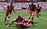 Boualem Khoukhi celebrates with teammates after scoring Qatar's first goal against Switzerland during the FIFA World Cup 2026 Group B match at San Francisco Bay Area Stadium on June 13, 2026 in Santa Clara, California.