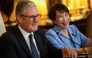 Britain's Prime Minister Keir Starmer (L) and Japan's Prime Minister Sanae Takaichi attend a business roundtable meeting at Downing Street in central London on June 14, 2026, as part of her governmental trip to the UK ahead of the G7 in France. (Photo by Toby Shepheard / POOL / AFP)