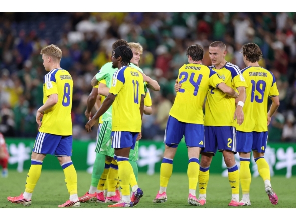 Sweden's players celebrate after winning the 2026 World Cup Group F football match between Sweden and Tunisia at the Monterrey Stadium in Guadalupe on June 14, 2026. (Photo by Julio Cesar Aguilar / AFP)