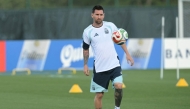 Argentina's forward #10 Lionel Messi eyes the ball as he takes part in an MD-1 training session at Sporting KC Training Centre in Kansas City, on June 15, 2026, on the eve of the 2026 World Cup Group H football match between Argentina and Algeria. (Photo by Juan Mabromata/ AFP)