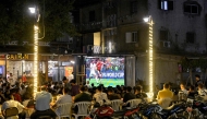 Egyptian football fans watch their national team's 2026 World Cup Group G football match against Belgium, at an outdoor cafe in the Sharabiya district of Cairo on June 15, 2026. (Photo by Khaled Desouki / various sources / AFP)
