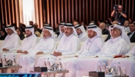Minister of Endowments (Awqaf) and Islamic Affairs H E Ghanem bin Shaheen bin Ghanem Al Ghanim, Minister of Commerce and Industry H E Sheikh Faisal bin Thani bin Faisal Al Thani and Chairman of the Organizing Committee and Vice Chairman of Bait Al-Mashura Finance Consultations Prof. Dr. Khalid bin Ibrahim Al-Sulaiti with other dignitaries during the conference yesterday.