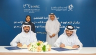 President of the SJC and President of the Court of Cassation H E Dr. Hassan bin Lahdan Al Hassan Al Mohannadi and Chairperson of the National Human Rights Committee H E Maryam bint Abdullah Al Attiyah witnessing the signing ceremony.

