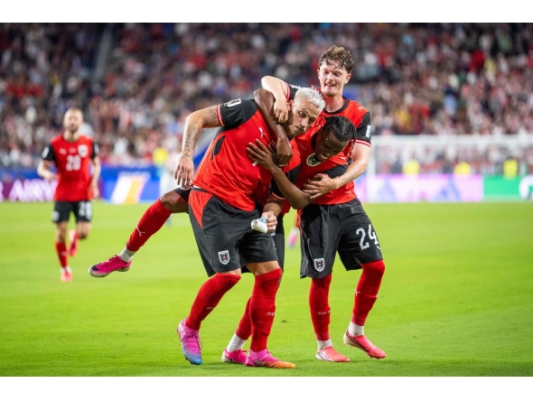 Austria's forward #07 Marko Arnautovic (L), celebrate with Austria's midfielder #17 Carney Chukwuemeka and Austria's midfielder #24 Paul Wanner after scoring a penalty shot during the 2026 World Cup Group J football. Photo by Georg Hochmuth / APA / AFP